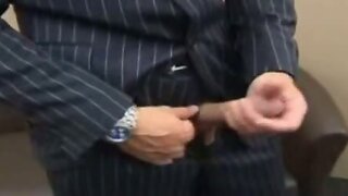 Masturbating in an expensive suit