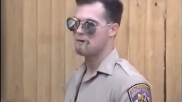 Cop sucks on leather cock