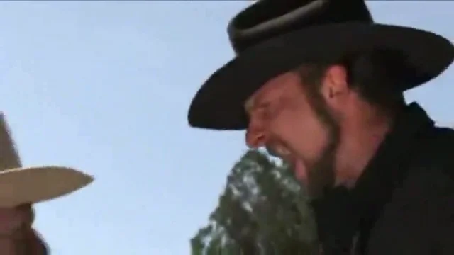 Cowboy fucked by two bandits