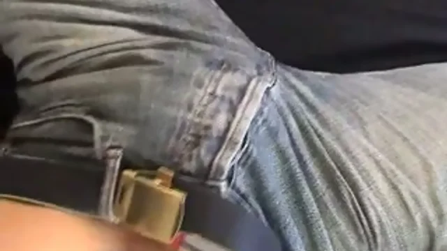 Hunky guy in jeans plays with himself