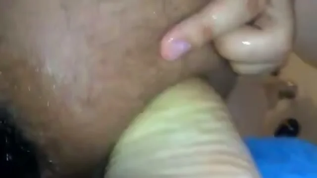 Close up views of butt drilled with a toy