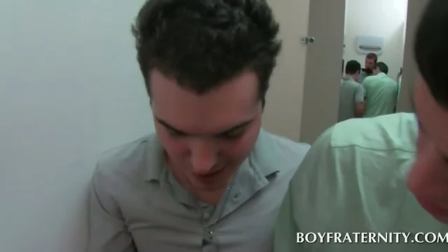 Two gay students blowing cock in mens room