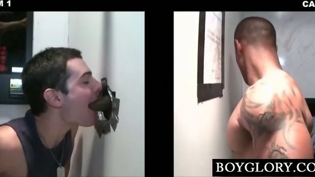 Afro stud getting a hot gay blowjob on gloryhole