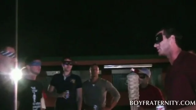 Blindfolded college boys in gay fraternity ritual