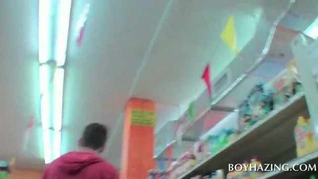 College fraternity candidates rubbing dicks in a store