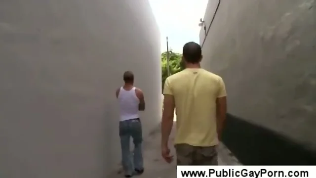 Sucking cock in an alley