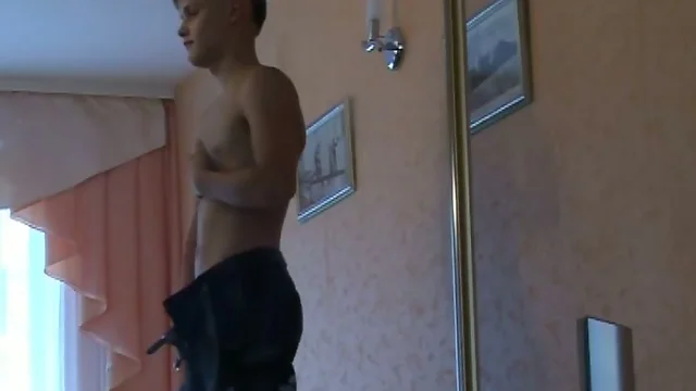 Bald twink takes out cock out of pants