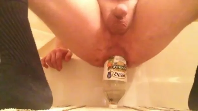 Giant bottle anal insertion