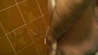 Hairy guy takes a shower