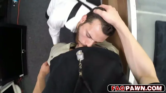 Sexy gay blows a cock in public pawn shop
