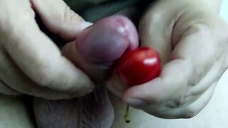 Uncut cock cumming twice on a cherry