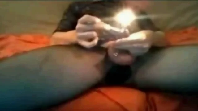 Candle burning down inside  hole - extreme dick torture