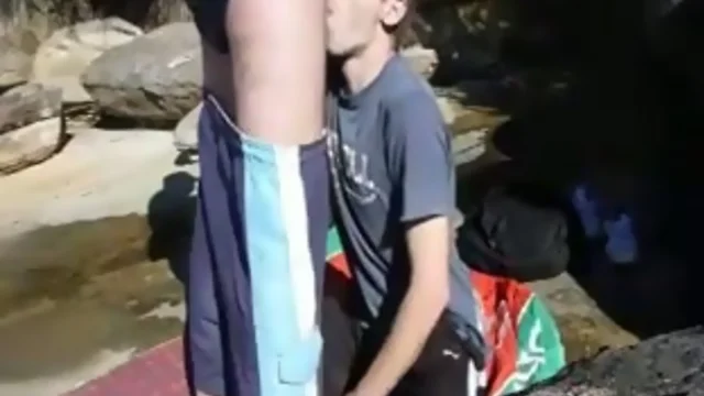teenage guy chokes on a load of semen at the beach