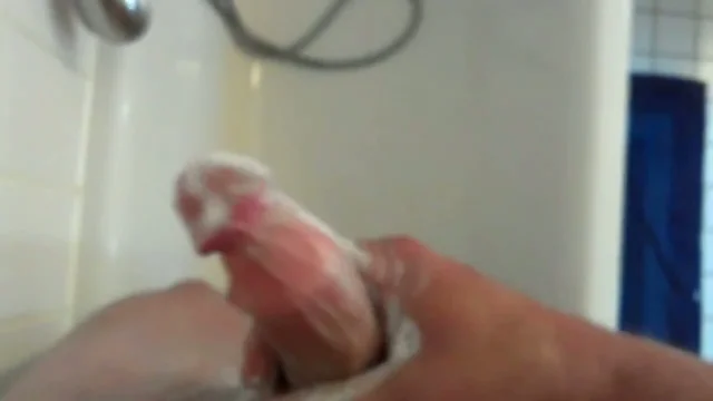masturbating and soaping up nice hard cock in the shower
