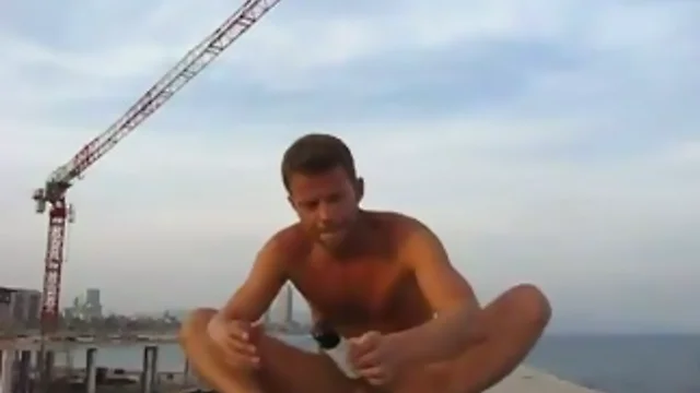 Buff gay bare and imploding outside construction site