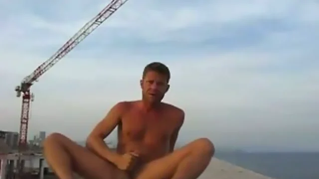 Buff gay bare and imploding outside construction site