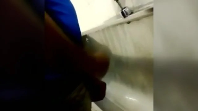 Jack Off at the urinal