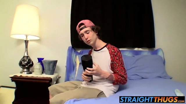 Skinny twink Sean playing around with a toy in his bedroom