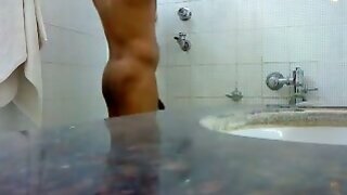 Innocent guy caught bathing at hotel room on spy cam