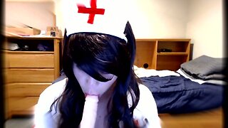 Cute Crossdresser Nurse Blows Dildo