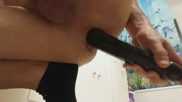 Deep and full anal penetration with a 12 inches dildo