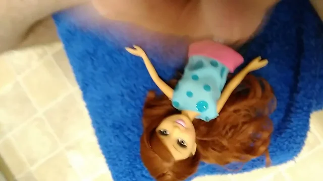 Redhead Doll loves cock and cum.