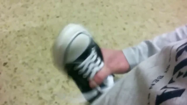 Shoes of unknown girls, in gym, cum inside black converse