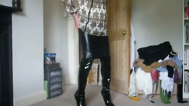 Fetish man as woman in thigh boots