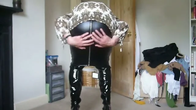 Fetish man as woman in thigh boots