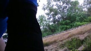 showing my swollen cock and balls outdoors