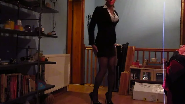 Having fun in my sexy black suit & stockings