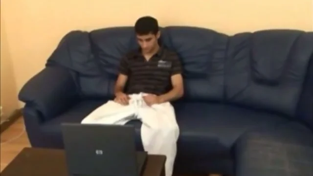 Two Horny Guys Get Off While Watching Porn Together