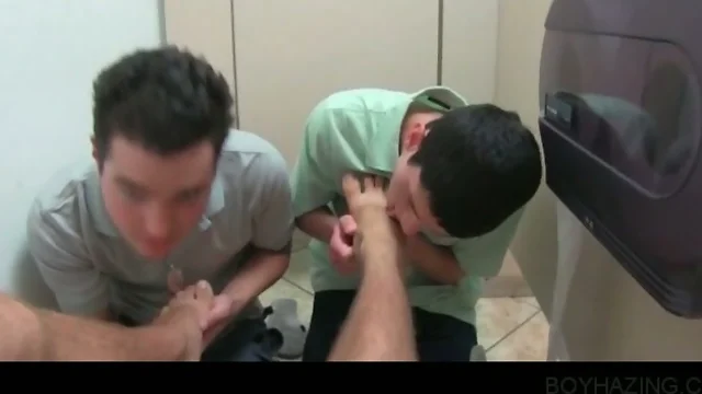 Hazed college boys sharing dick to suck on