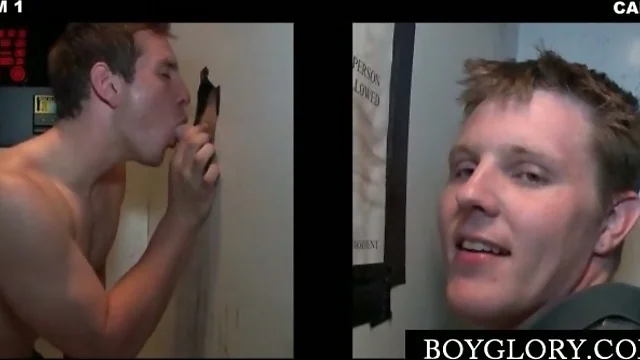 Sexy gay sucking cock with lust on gloryhole