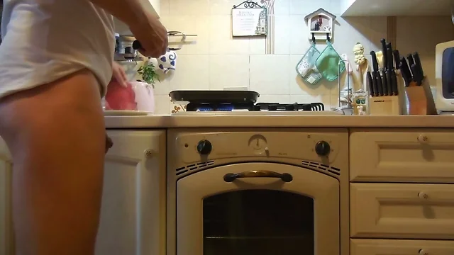Cooking a steak with a giant butt plug in my ass