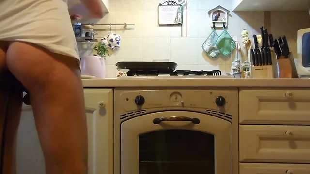 Cooking a steak with a giant butt plug in my ass