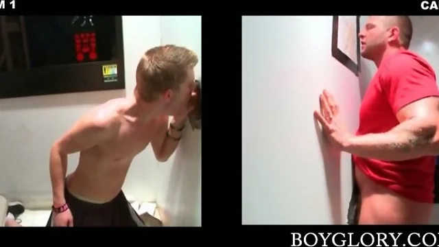 Teen gay on knees blows cock on gloryhole