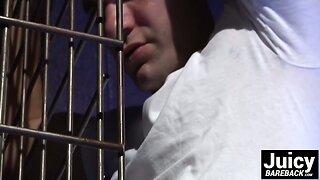 Caged dude sucks a dick and offers his asshole for a fuck