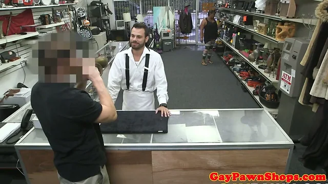 Straight guy sucks pawnbroker behind counter