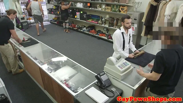 Straight guy sucks pawnbroker behind counter