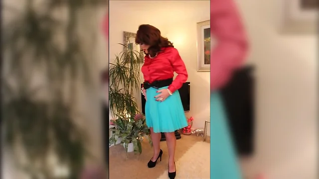 Red blouse and turquoise  skirt