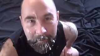 This guy loves to get his face and beard covered in cum