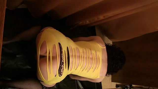 Yellow top and black dildo