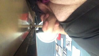 Playing with my uncut cock at my desk at work Part 1