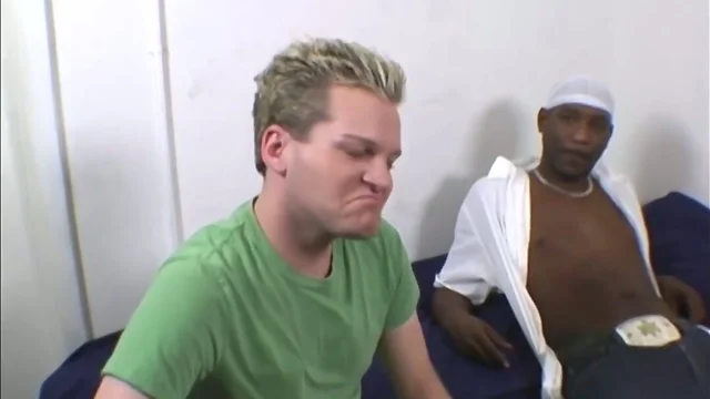Blonde guy does terrible blowjob on a black cock