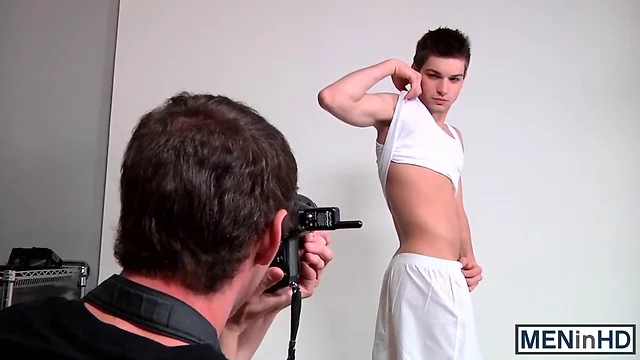 Johnny Rapid is posing for photographer Sam Truitt to help