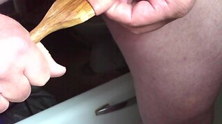 Large wooden spoon stretches foreskin !
