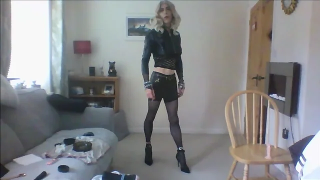 A girl in leather and stockings
