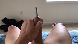 8mm sound fully inserted in my cock until it pops back out