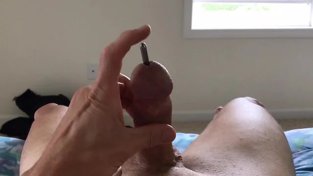 8mm sound fully inserted in my cock until it pops back out
